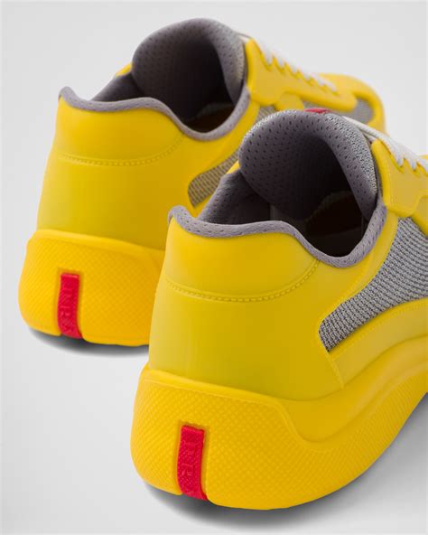 yellow prada sneakers.